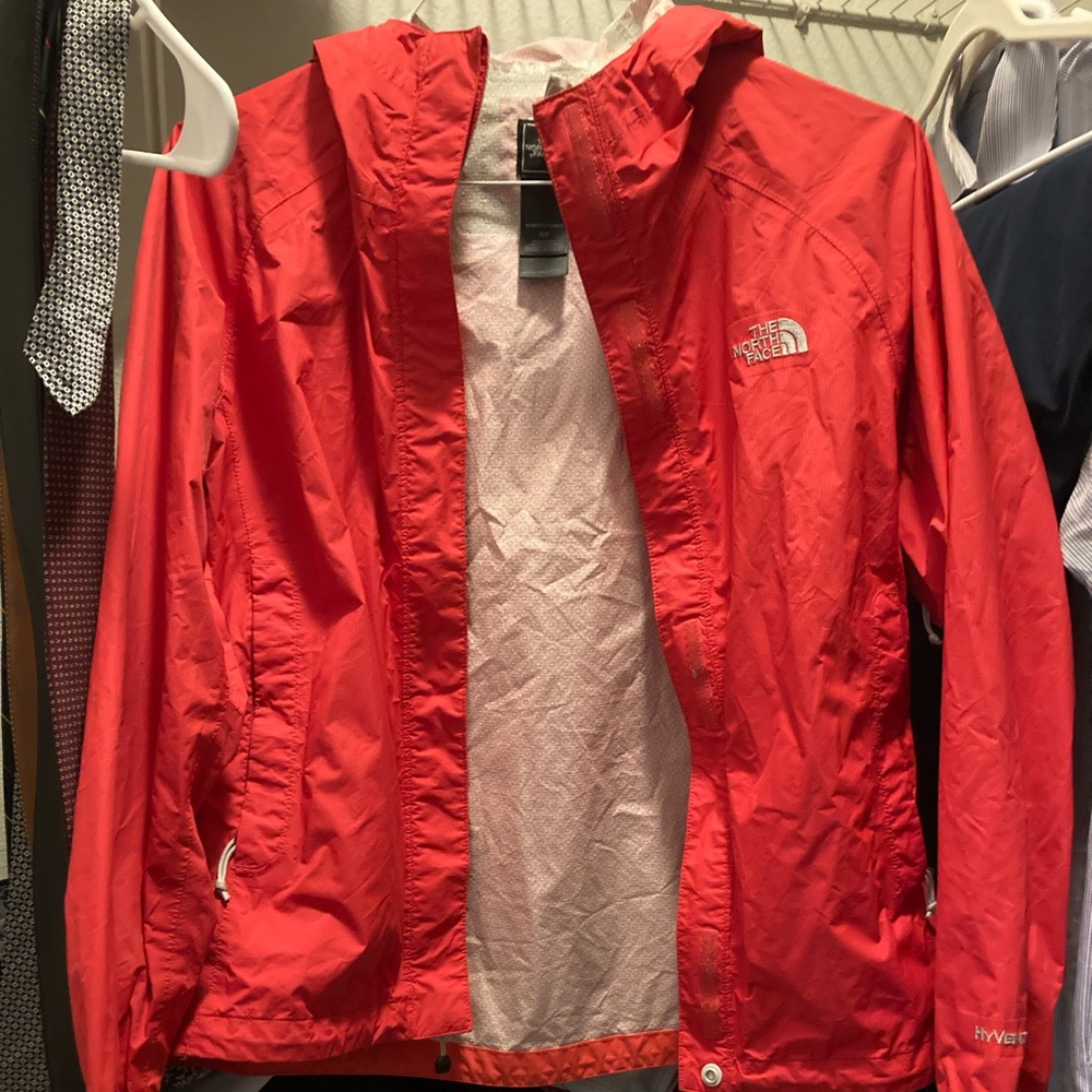 The north face red rain jacket, size small, no flaws!